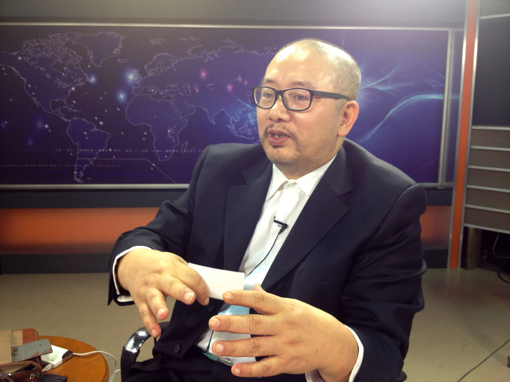 谭季青：人类活动加剧高温的形成